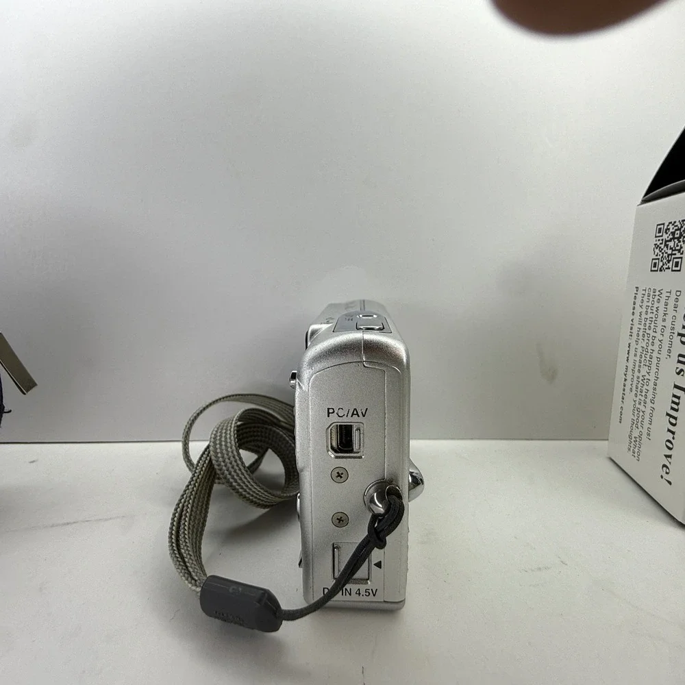 Pentax Optio S5z Silver Digital Camera 5.0MP 3x Zoom Bundle with Charger Case